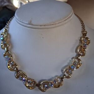 Elegant Gold Necklace with Iridescent Accents